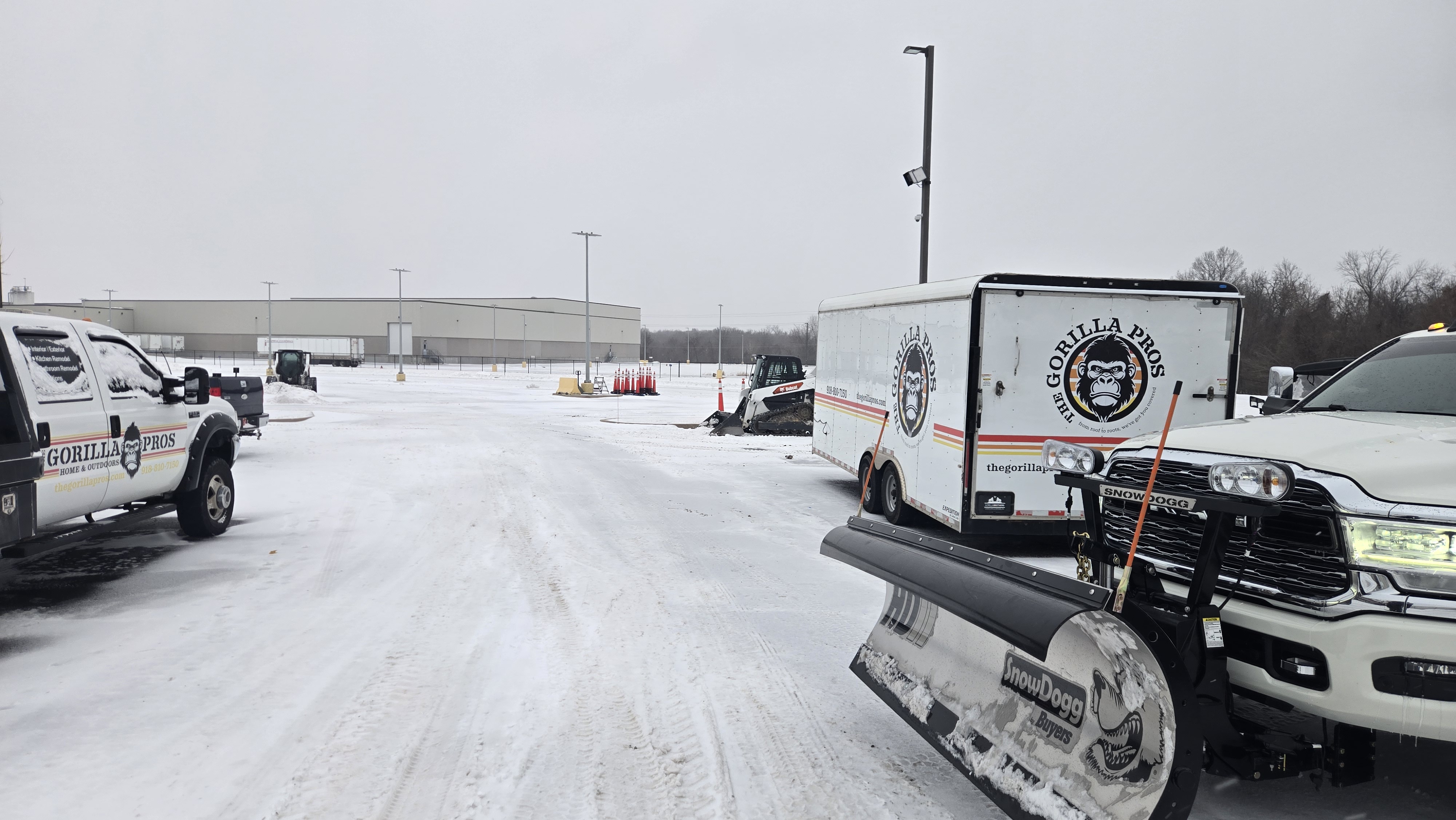 Commercial snow removal in Tulsa with Gorilla Brothers plow trucks and snow removal equipment